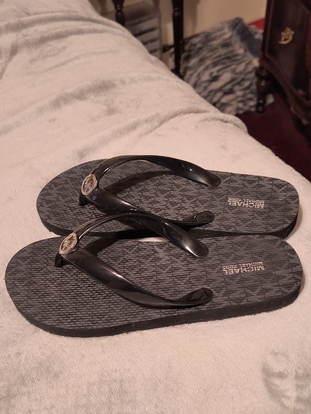MK black flip flops size 7